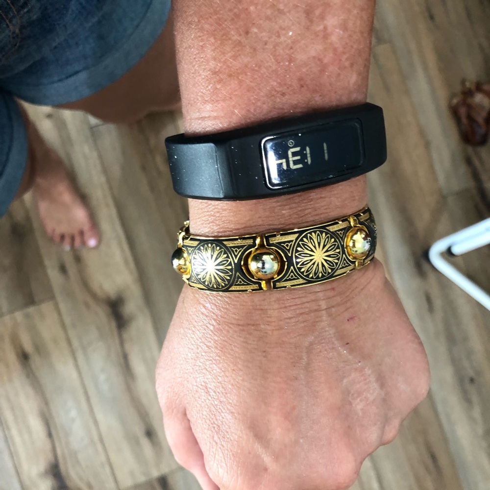 Gold tone and black bracelet